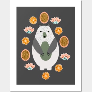 Bear cub among flowers Posters and Art